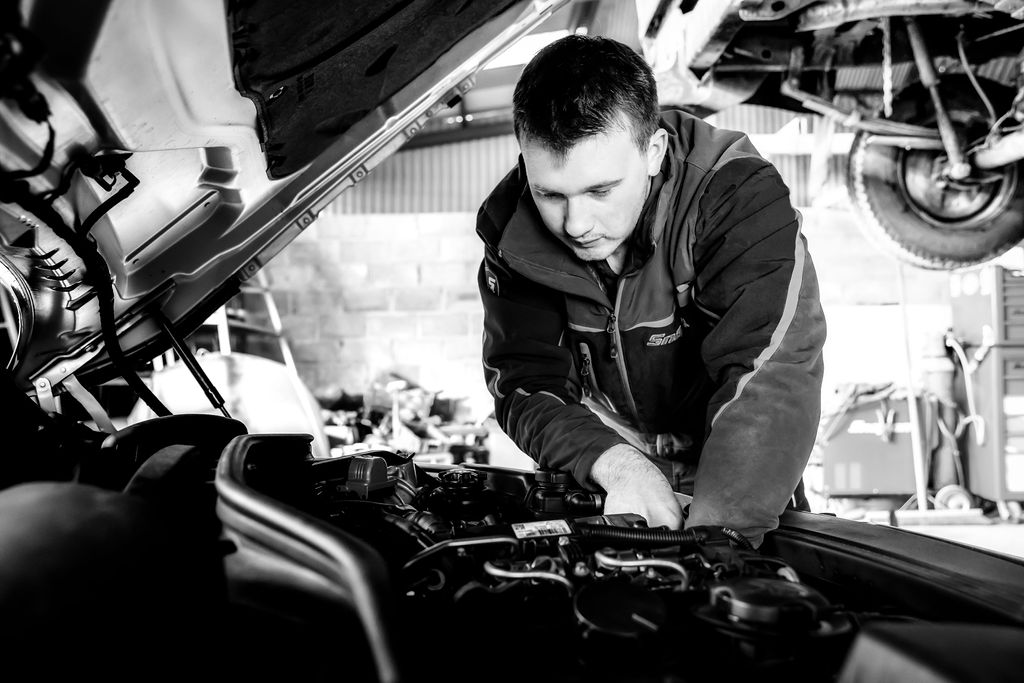 mechanic fixing a car