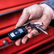 a hand holding car keys